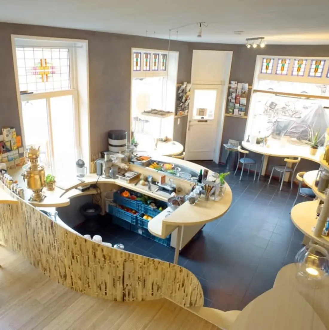 Inside Alchemist Garden — the curved counter and seating area