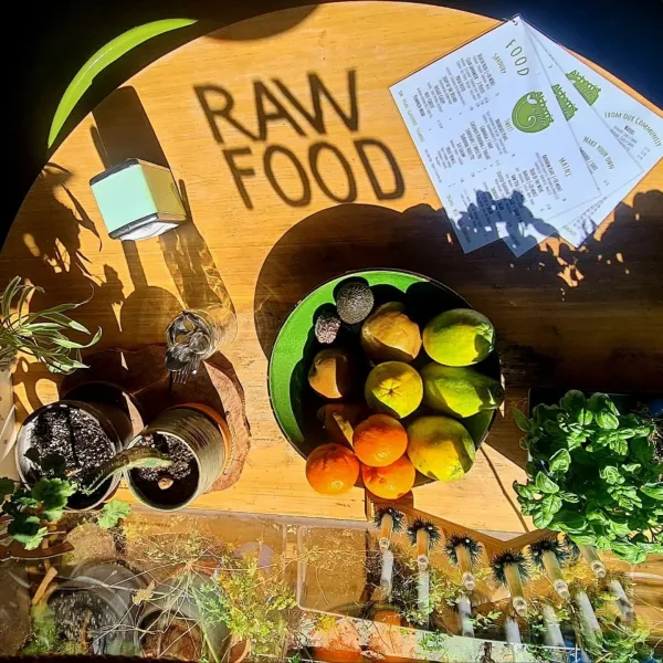 RAW FOOD shadow on wooden counter